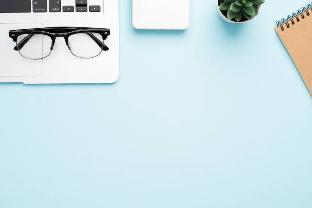 istock Top view with copy space of office desk with accessories 1155576905
