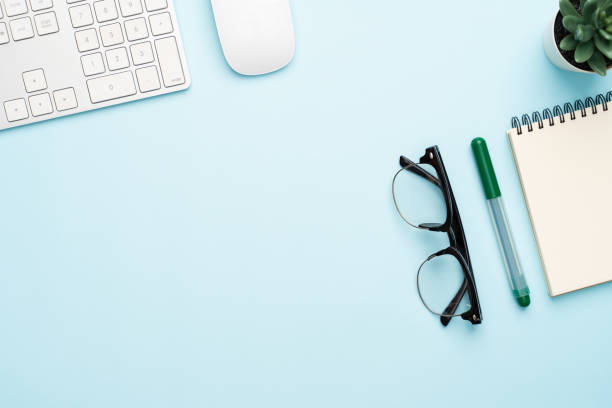 istock Top view with copy space of office desk with accessories 1155576925