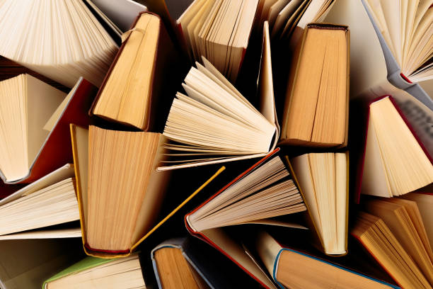 istock Old and used hardback books  top view - Image 1155578072
