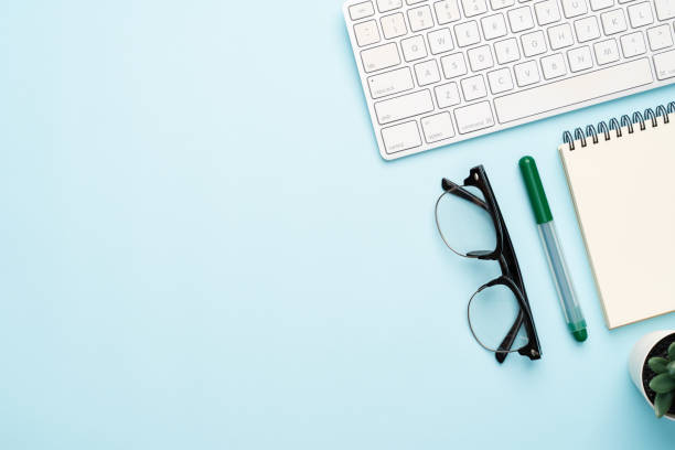 istock Top view with copy space of office desk with accessories 1155578132