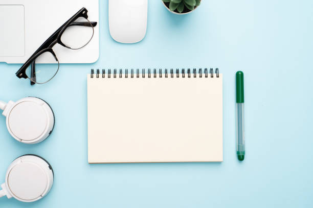 istock Top view with copy space of office desk with accessories 1155578181