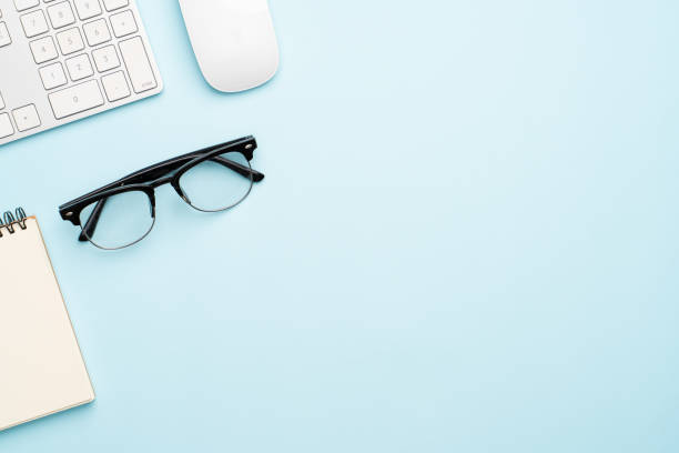 istock Top view with copy space of office desk with accessories 1155578208