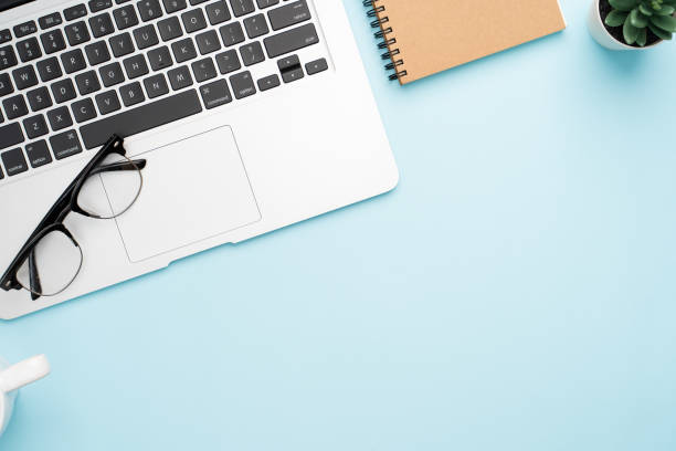istock Top view with copy space of office desk with accessories 1155578220