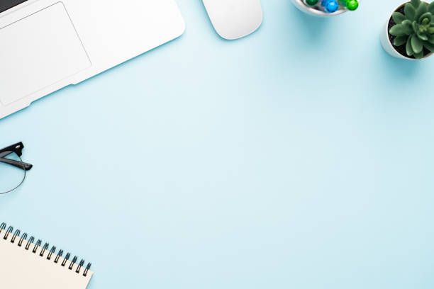 istock Top view with copy space of office desk with accessories 1155578243