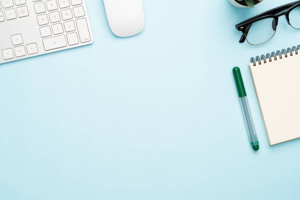 istock Top view with copy space of office desk with accessories 1155578262