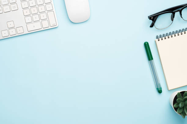 istock Top view with copy space of office desk with accessories 1155578306