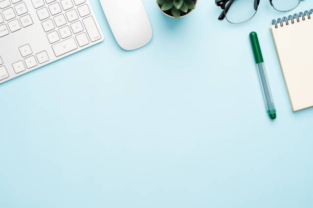 istock Top view with copy space of office desk with accessories 1155578371