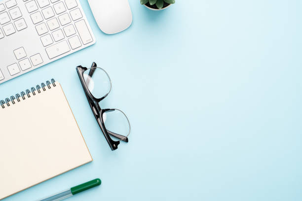 istock Top view with copy space of office desk with accessories 1155578441