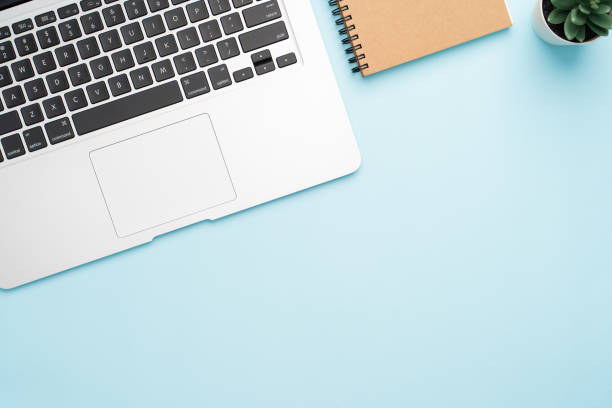 istock Top view with copy space of office desk with accessories 1155578952