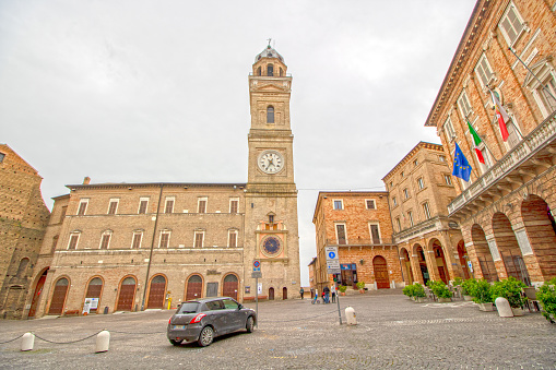 At Macerata - Marche - Italy - On april 2019 - Freedom Square with the Civic Tower (15th-17th century), and St.Paul church Macerata, Marche, Italy