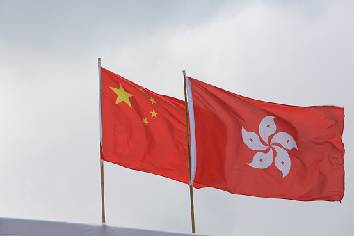 china and hong kong flag waving