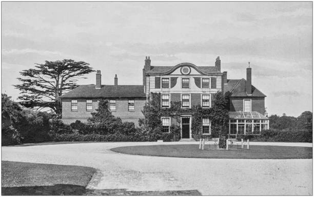 istock Antique vintage black and white photo: British countryside house 1155587281