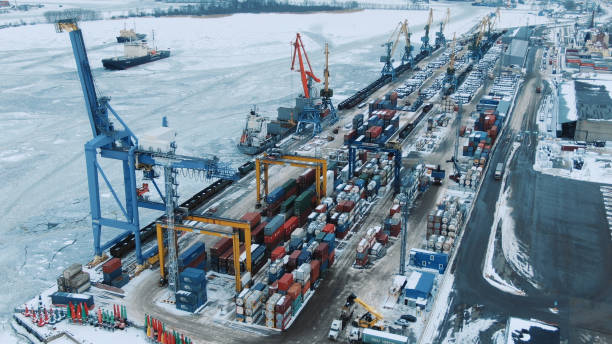 istock Aerial view port container terminal container ship in import export and business logistic at Deep water port 1155593715