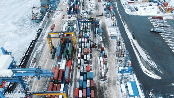 istock Aerial view port container terminal container ship in import export and business logistic 1155593738
