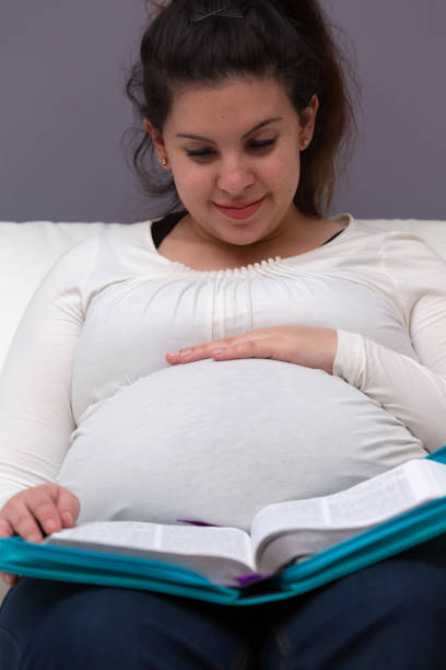 istock Pregnant Mother Bible Study Devotional Time 1155594731