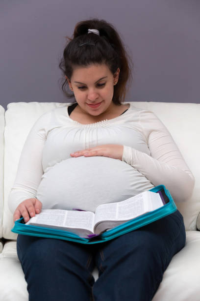 istock Pregnant Mother Bible Study Devotional Time 1155594734