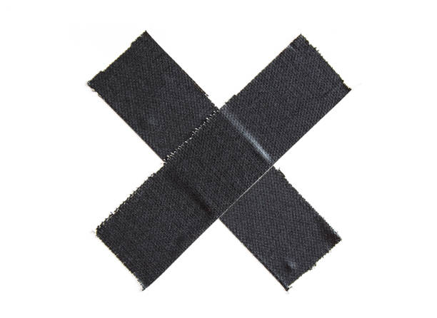 istock Black matte cloth gaffer tape cross isolated on white background. 1155594847