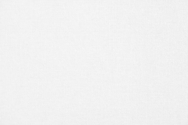 Closeup white blank canvas for drawing. White fabric texture background. stock photo