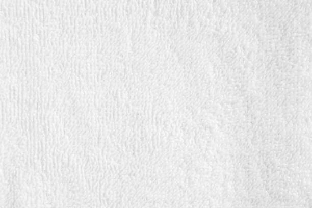 istock Closeup white blank soft terry towel texture background. 1155594970