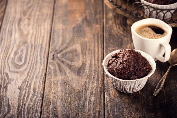 istock Chocolate muffins with banana 1155595328