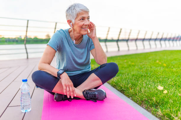 istock Senior Woman Resting After Exercises 1155603266