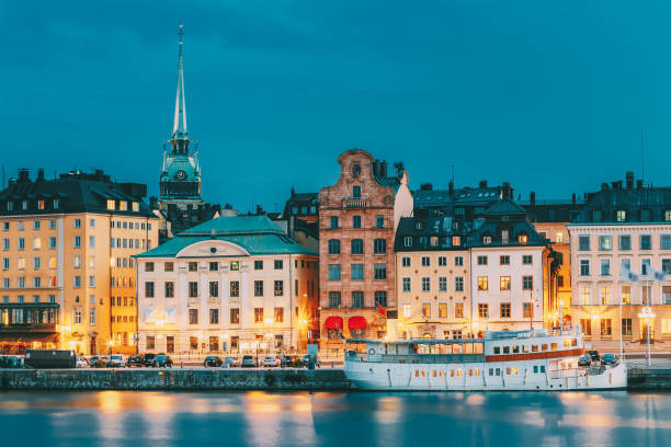 istock Buildings And Harbor Against Blue Sky 1155606536