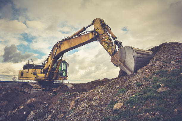 istock Excavator carrying out dismantling tasks in a construction site 1155606958