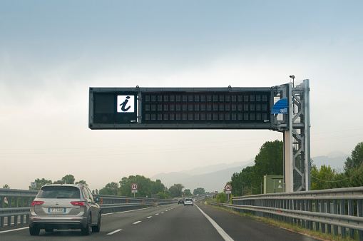 PISA , ITALY - June 10, 2019:  Electronic scoreboard for information on traffic and weather on an Italian motorway