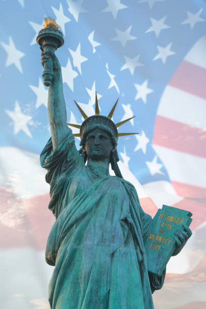istock Statue of liberty with American flag double exposure 1155608993