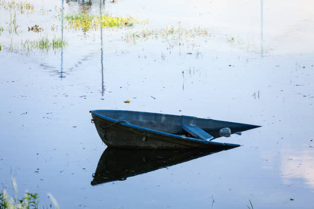 Flooding in city, recreational boat sunk during heavy raining, , Danube and Sava river confluence, Belgrade, Serbia