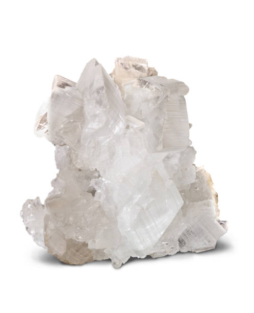 istock White gypsum crystals on a white background. 1155611247