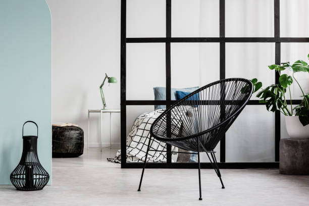 istock Scandinavian bedroom interior with comfortable bed and mullions wall 1155612639