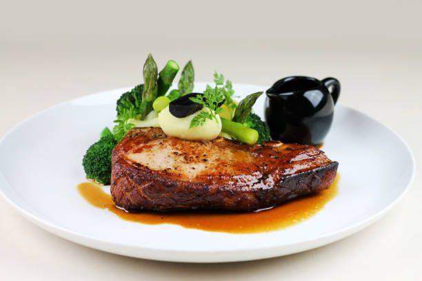 istock Traditional Beef steak with steamed vegetables. 1155614419