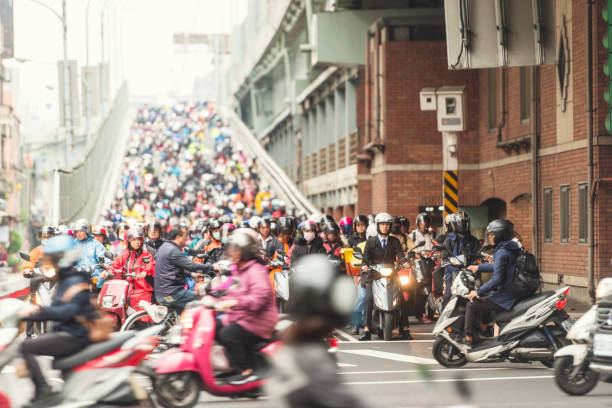 istock Chaotic scooter traffic in Taipei 1155614535
