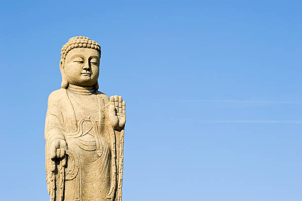 istock Buddha Statue with lots of copy-space 115561538