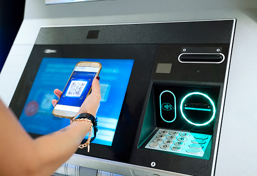 Using Qr code by mobile phone, contactless withdraw money from cash machine