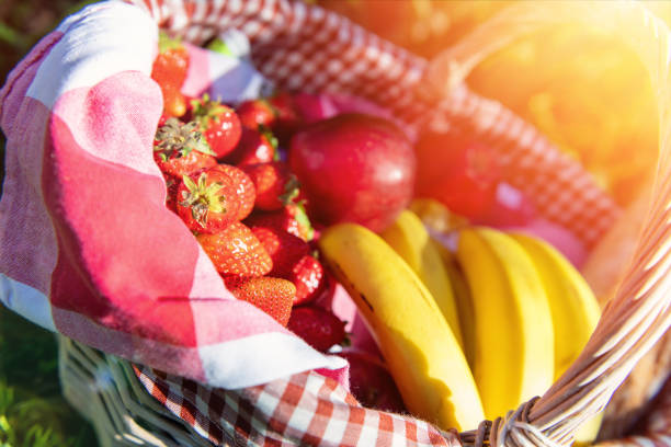 Picnic basket with fresh fruits