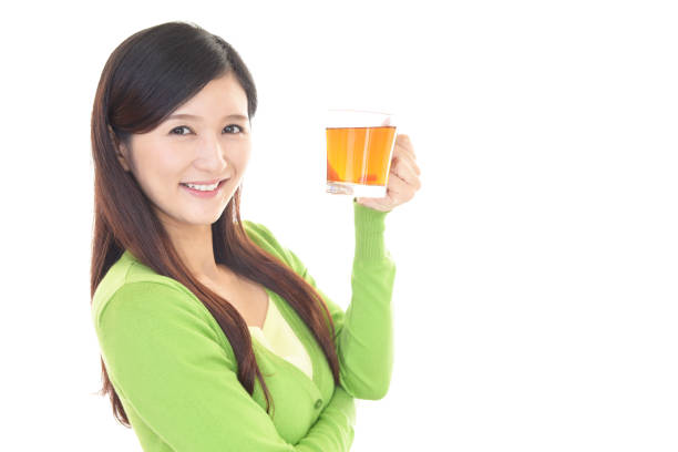 young woman drinking a cup of tea