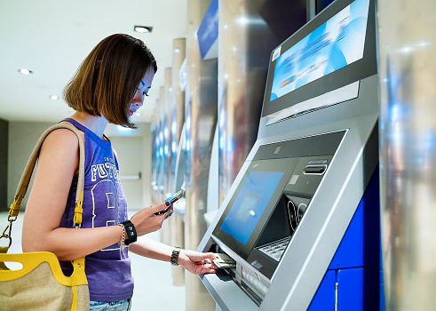 Using Qr code by mobile phone, contactless withdraw money from cash machine