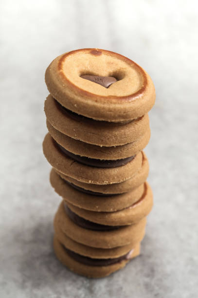 istock Cookies with chocolate cream on the table. 1155620243