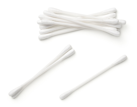 White cotton swab isolated on white background. Top view, flat lay