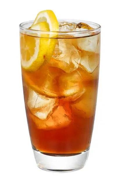 Photo of a glass of frozen lemon black tea on a white background