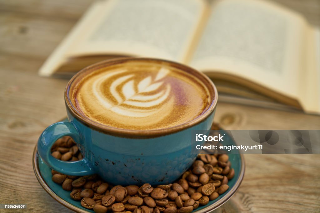 coffee Latte coffee, coffee beans and book Book Stock Photo