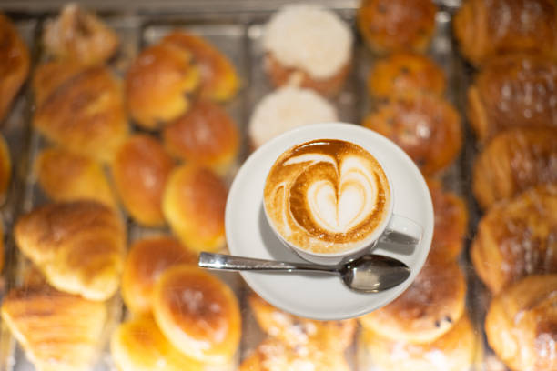 Italian cappuccino coffee with pastries in cafe