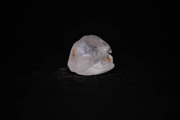 istock halite mineral from Pakistan with black background 1155626060