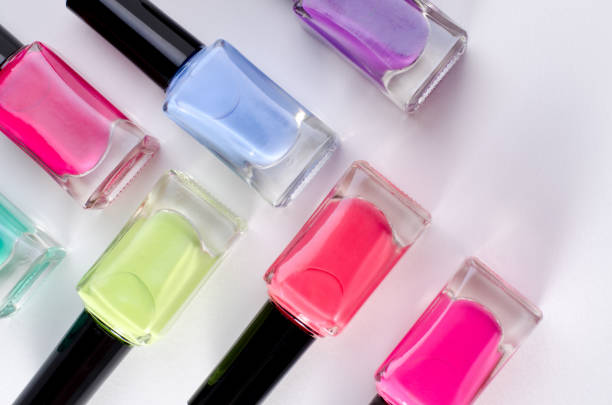 istock Nail polish tubes isolated on white background. 1155626878