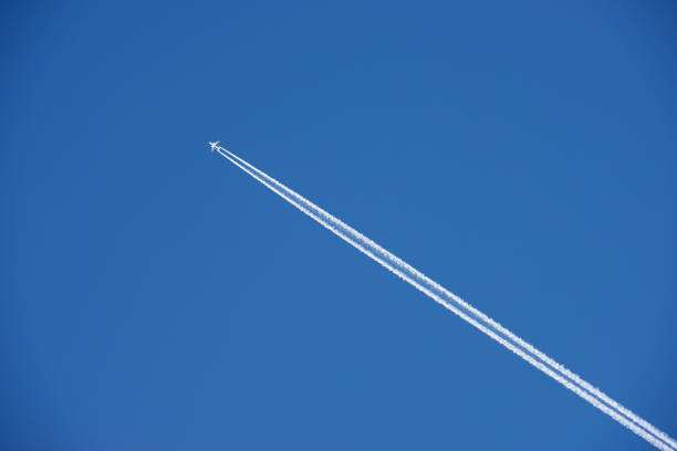 Stele of an airplane and blue sky.