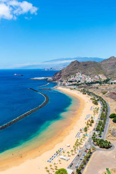 ready to get sun tan at playa de las teresitas in tenerife? - clear sky spain tenerife canary islands imagens e fotografias de stock