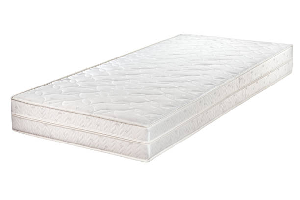 istock Orthopedic mattress with pattern fabric on white background 1155631053