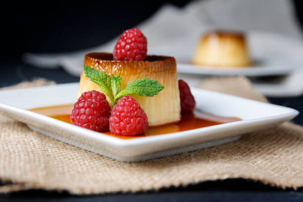 istock Egg flan with raspberries and mint leaves 1155635559